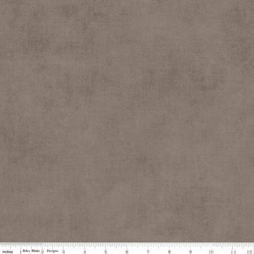 Image of the Shades Pebble quilting cotton fabric by Riley Blake Designs. Features a grey brown fabric with a mottled semisold background. 
Cute Little Fabric Shop