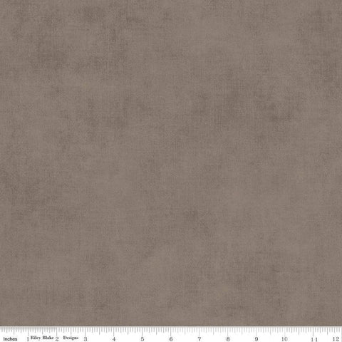 Image of the Shades Pebble quilting cotton fabric by Riley Blake Designs. Features a grey brown fabric with a mottled semisold background. 
Cute Little Fabric Shop