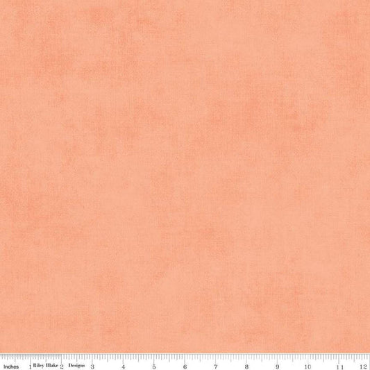 Image of the Shades Marmalade quilting cotton fabric by Riley Blake Designs. Features a light orange fabric with a mottled semisold background. 
Cute Little Fabric Shop