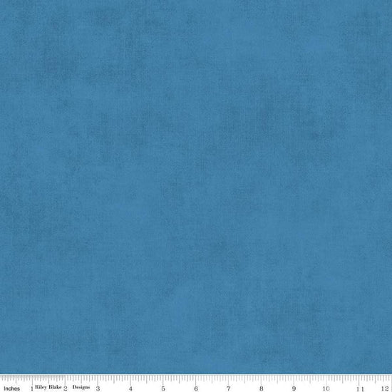 Image of the Shades Coastal Blue quilting cotton fabric by Riley Blake Designs. Features a dark sky blue fabric with a mottled semisold background. 
Cute Little Fabric Shop