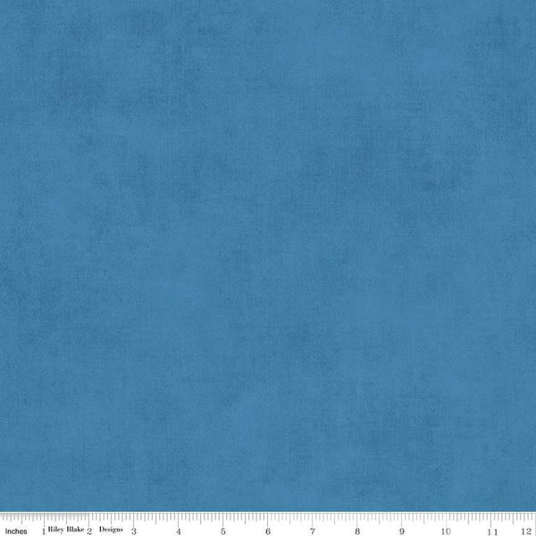 Image of the Shades Coastal Blue quilting cotton fabric by Riley Blake Designs. Features a dark sky blue fabric with a mottled semisold background. 
Cute Little Fabric Shop