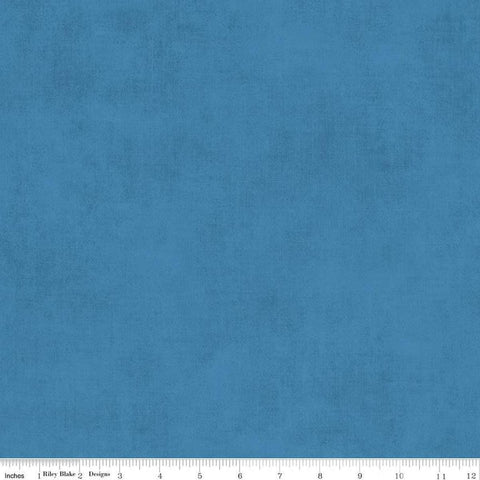Image of the Shades Coastal Blue quilting cotton fabric by Riley Blake Designs. Features a dark sky blue fabric with a mottled semisold background. 
Cute Little Fabric Shop