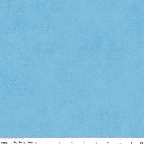Image of the Shades Celestial quilting cotton fabric by Riley Blake Designs. Features a light blue fabric with a mottled semisold background. 
Cute Little Fabric Shop