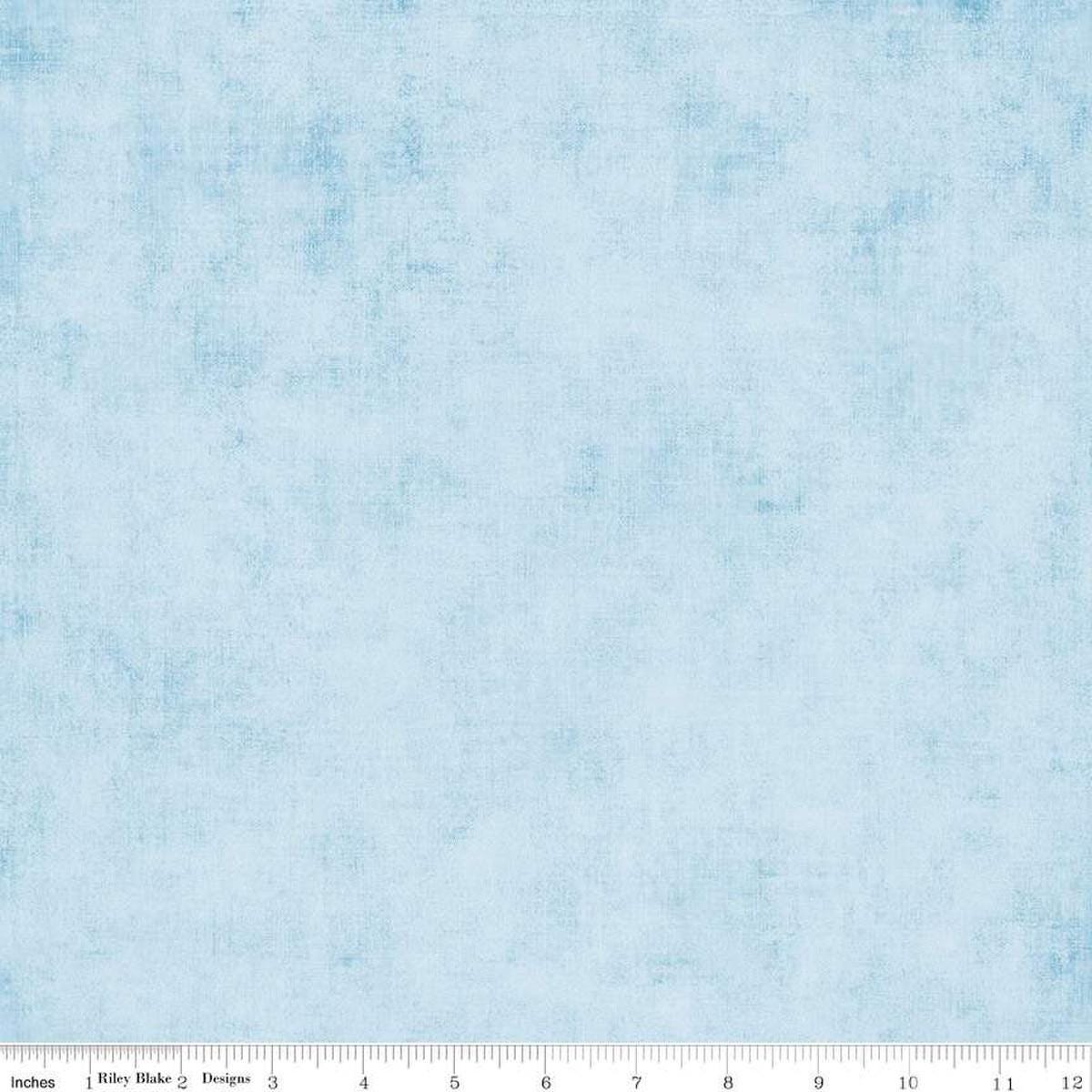 Image of the Shades Boy Blue quilting cotton fabric by Riley Blake Designs. Features a light blue fabric with a mottled semisold background. 
Cute Little Fabric Shop