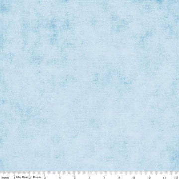 Image of the Shades Boy Blue quilting cotton fabric by Riley Blake Designs. Features a light blue fabric with a mottled semisold background. 
Cute Little Fabric Shop
