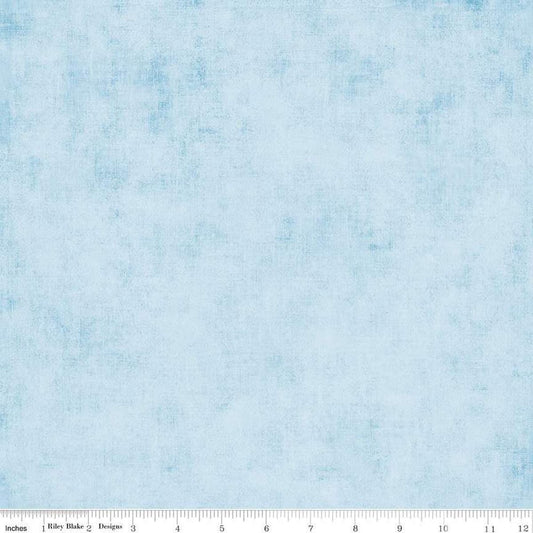 Image of the Shades Boy Blue quilting cotton fabric by Riley Blake Designs. Features a light blue fabric with a mottled semisold background. 
Cute Little Fabric Shop