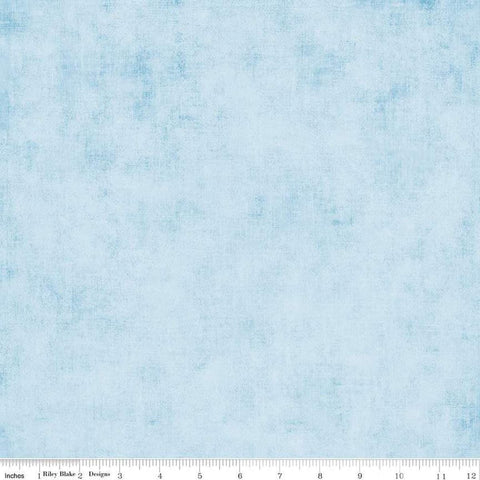 Image of the Shades Boy Blue quilting cotton fabric by Riley Blake Designs. Features a light blue fabric with a mottled semisold background. 
Cute Little Fabric Shop