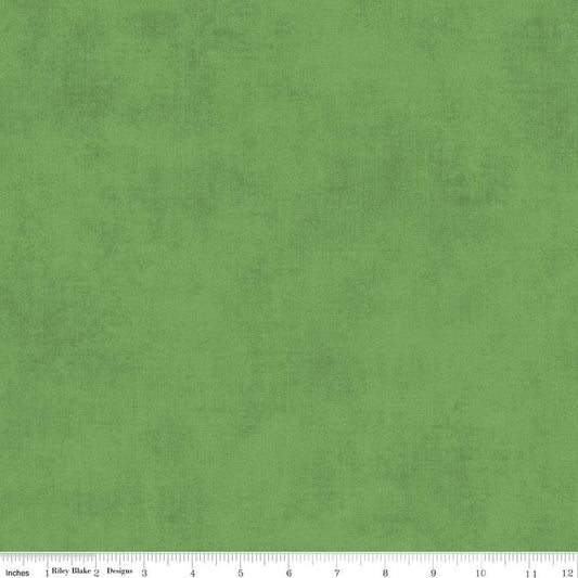 Image of the Shades Basil quilting cotton fabric by Riley Blake Designs. Features a green fabric with a mottled semisold background. 
Cute Little Fabric Shop