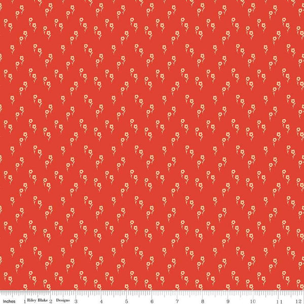 Image of the Wanderlust Jasmine Persimmon quilting cotton fabric by Danelys Sidron for Riley Blake Designs. Features an array of flowers on an orange red background. 
Cute Little Fabric Shop