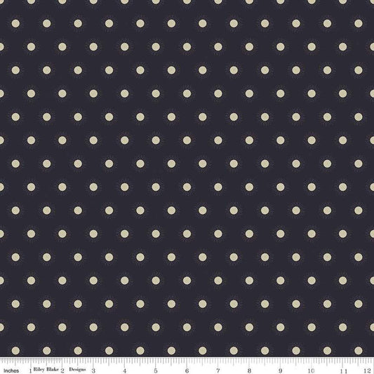 Image of the Wanderlust Sunshine Charcoal quilting cotton fabric by Danelys Sidron for Riley Blake Designs. Features an array of small suns on a dark blue black background. 
Cute Little Fabric Shop