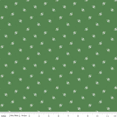 Image of the Perennial Bees Clover quilting cotton fabric by Jill Finley for Riley Blake Designs. Features small bees scattered on a green background. 
Cute Little Fabric Shop