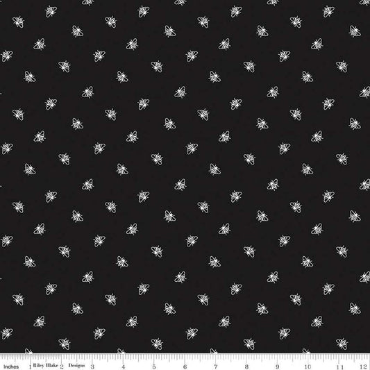 Image of the Perennial Bees Black quilting cotton fabric by Jill Finley for Riley Blake Designs. Features small bees scattered on a black background. 
Cute Little Fabric Shop