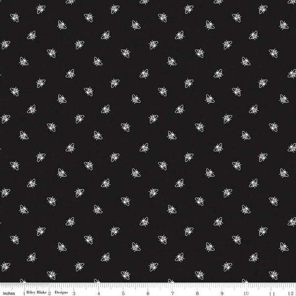 Image of the Perennial Bees Black quilting cotton fabric by Jill Finley for Riley Blake Designs. Features small bees scattered on a black background. 
Cute Little Fabric Shop