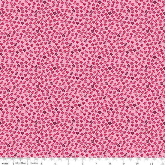 Image of the Perennial Mini Rose quilting cotton fabric by Jill Finley for Riley Blake Designs. Features small flowers on a light pink background. 
Cute Little Fabric Shop