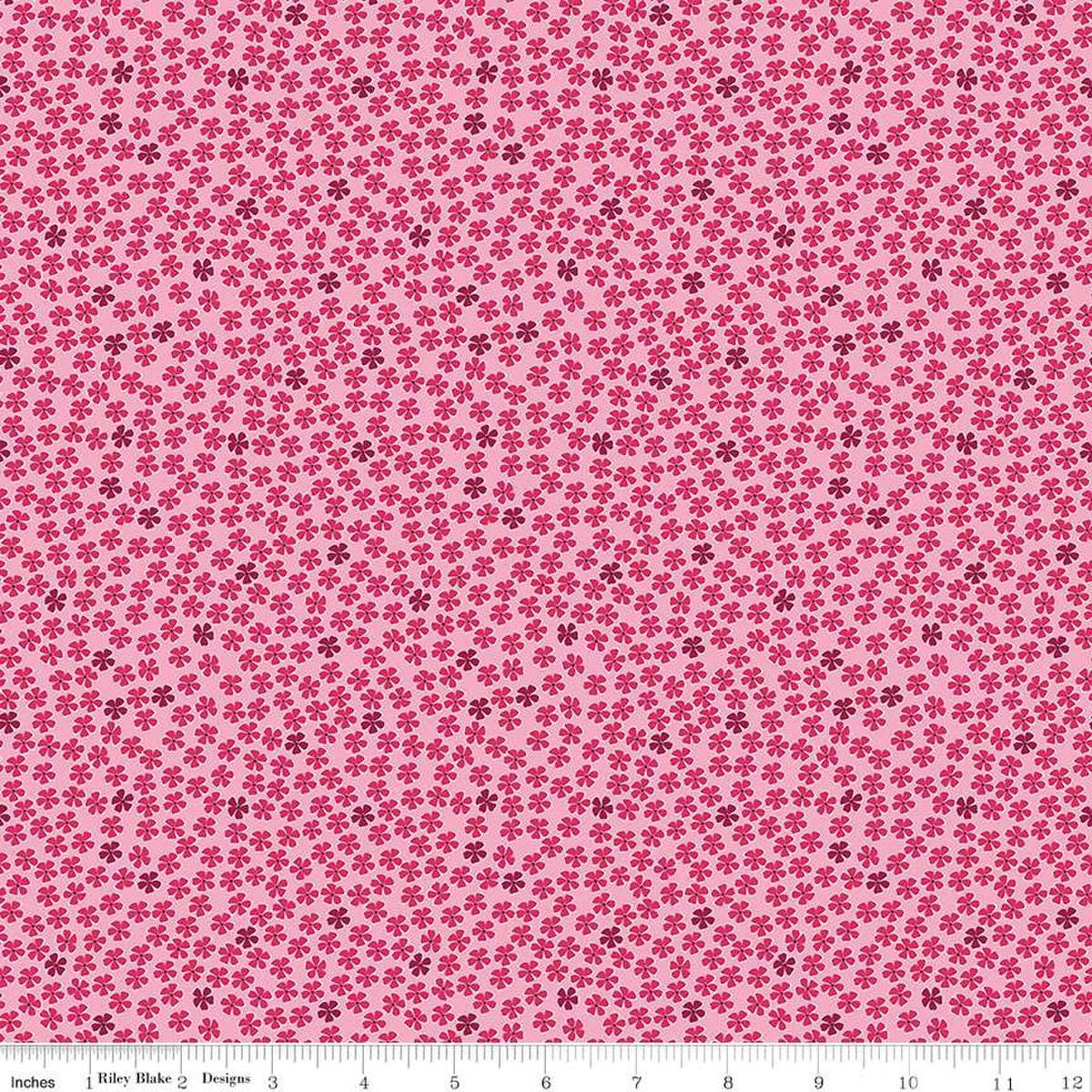 Image of the Perennial Mini Rose quilting cotton fabric by Jill Finley for Riley Blake Designs. Features small flowers on a light pink background. 
Cute Little Fabric Shop