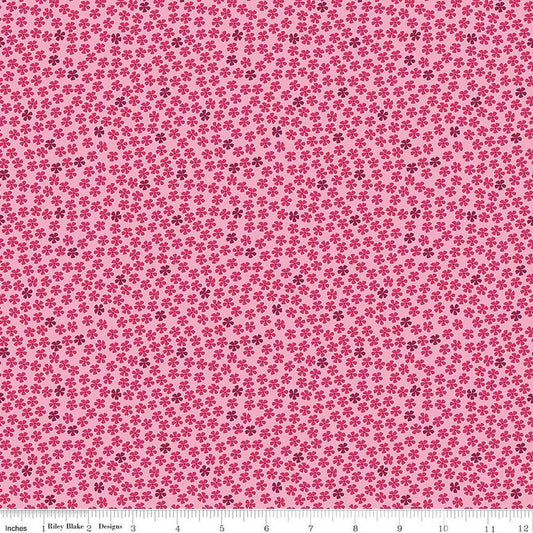 Image of the Perennial Mini Rose quilting cotton fabric by Jill Finley for Riley Blake Designs. Features small flowers on a light pink background. 
Cute Little Fabric Shop