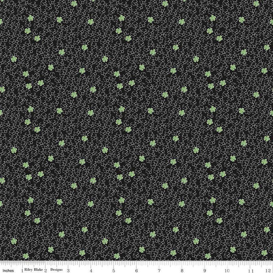 Image of the Perennial Mini Black quilting cotton fabric by Jill Finley for Riley Blake Designs. Features small flowers on a black background. 
Cute Little Fabric Shop