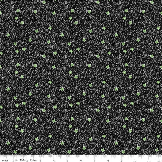 Image of the Perennial Mini Black quilting cotton fabric by Jill Finley for Riley Blake Designs. Features small flowers on a black background. 
Cute Little Fabric Shop