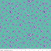 Image of the Botanic Blast Blossoms Vivid quilting cotton fabric by Sew Yeah Quilting for Riley Blake Designs. Features scattered flowers on a green blue background.
Cute Little Fabric Shop
