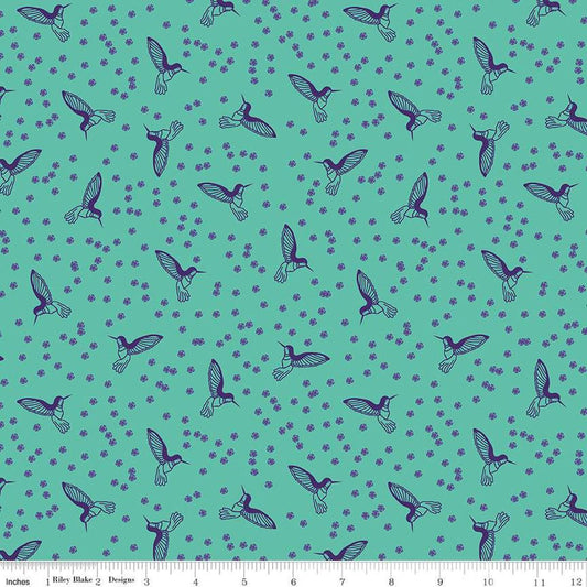 Image of the Botanic Blast Hummingbirds Vivid quilting cotton fabric by Sew Yeah Quilting for Riley Blake Designs. Features scattered blossoms and hummingbirds on a green blue background.
Cute Little Fabric Shop