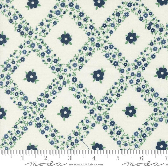 Image of the Rosemary Cottage Trellis Cream Navy quilting cotton fabric by Moda Fabrics. Features criss cross flowers on a cream background.
Cute Little Fabric Shop