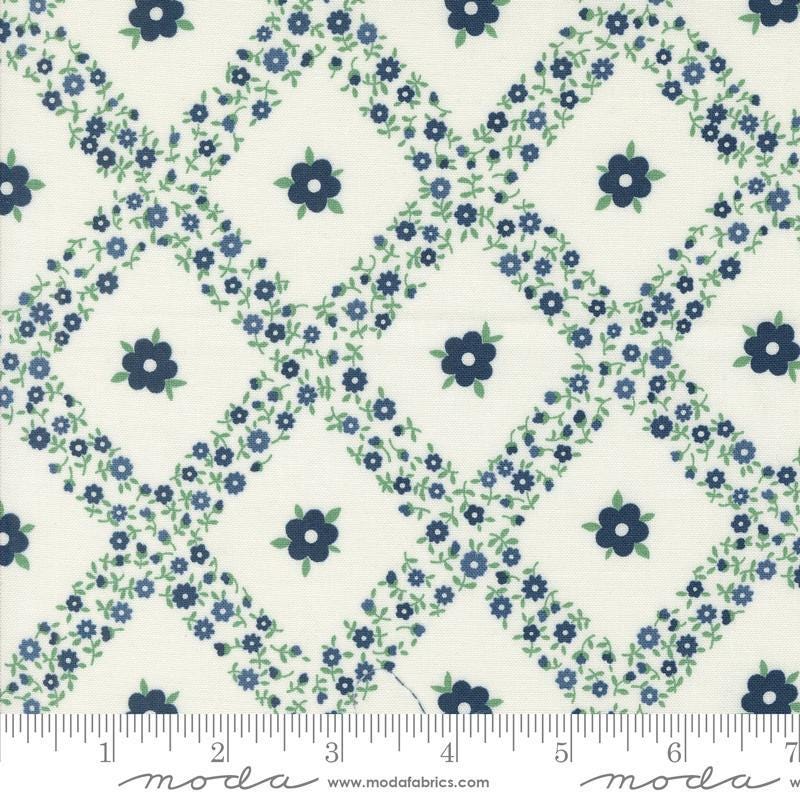Image of the Rosemary Cottage Trellis Cream Navy quilting cotton fabric by Moda Fabrics. Features criss cross flowers on a cream background.
Cute Little Fabric Shop