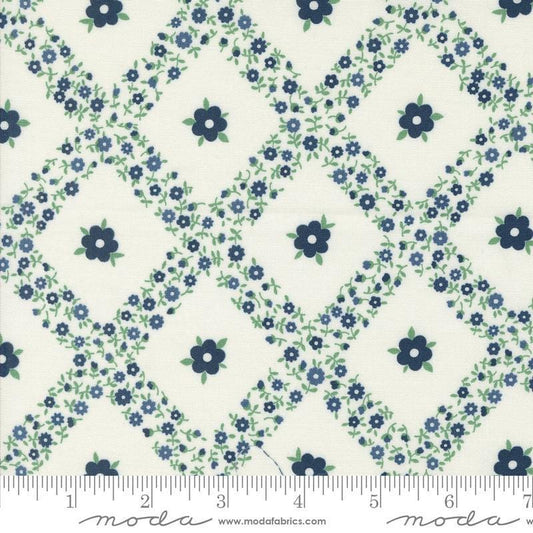 Image of the Rosemary Cottage Trellis Cream Navy quilting cotton fabric by Moda Fabrics. Features criss cross flowers on a cream background.
Cute Little Fabric Shop