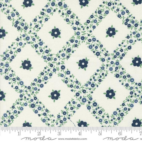 Image of the Rosemary Cottage Trellis Cream Navy quilting cotton fabric by Moda Fabrics. Features criss cross flowers on a cream background.
Cute Little Fabric Shop