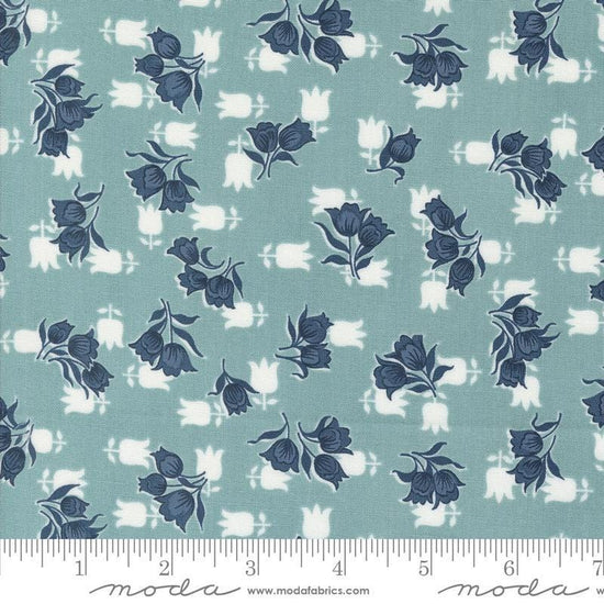 Image of the Rosemary Cottage Tulips Sky quilting cotton fabric by Moda Fabrics. Features small tulips on a teal blue background.
Cute Little Fabric Shop