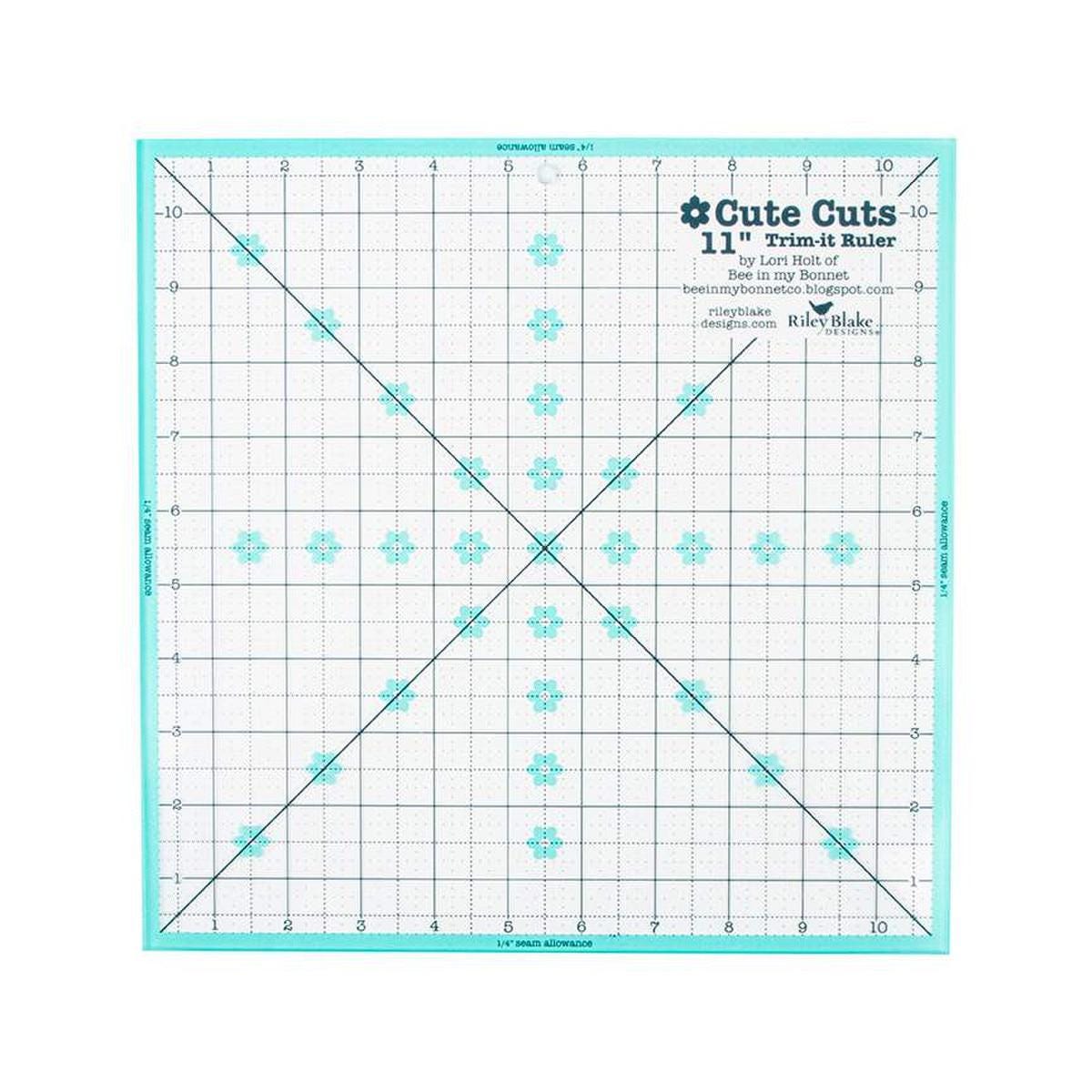 Image of the Cute Cuts™ Trim-it™ Ruler 11 inch; x 11 inch; by Lori Holt for Riley Blake Designs. Features a 11 inch square ruler with aqua borders. 
Cute Little Fabric Shop