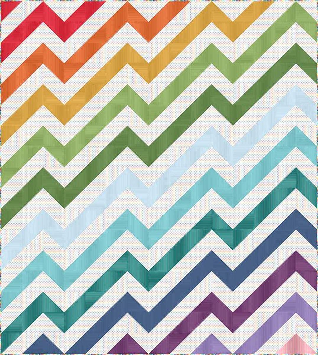 Image of the Kenzie Quilt Pattern by Purple Daisy Quilt Designs for Riley Blake Designs. Features half square triangles that create a rainbow of elongated chevron stripes. 
Cute Little Fabric Shop