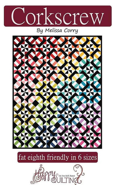 Image of the Corkscrew quilt pattern by Melissa Corry for Riley Blake Designs. Features a geometric colorful design on a quilt. 
Cute Little Fabric Shop