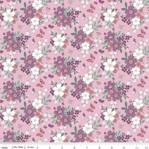 Image of the Buds & Butterflies Main Mauve quilting cotton fabric by Cayla Naylor for Riley Blake Designs. Features flowers and butterflies on a pink background. 
Cute Little Fabric Shop