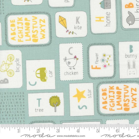 Image of the Shine Flashcards Sky quilting cotton fabric by Sweetwater for Moda Fabrics. Features alphabet flashcards with words and pictures on a light blue background. 
Cute Little Fabric Shop