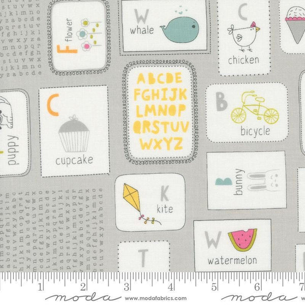 Image of the Shine Flashcards Sky quilting cotton fabric by Sweetwater for Moda Fabrics. Features alphabet flashcards with words and pictures on a gray background. 
Cute Little Fabric Shop