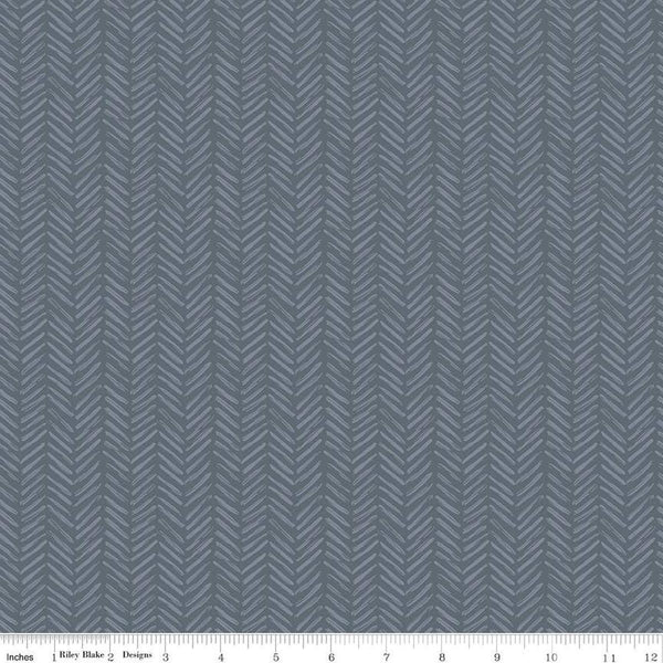 Image of the It Takes a Village Tread Marks Smoke quilting cotton fabric by Jennifer Long for Riley Blake Designs. Features a tone-on-tone herringbone pattern a dusty blue gray background. 
Cute Little Fabric Shop