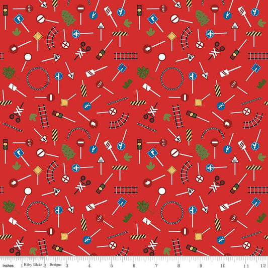 Image of the It Takes a Village Traffic Signs Fire quilting cotton fabric by Jennifer Long for Riley Blake Designs. Features street signs, trees, train tracks, and more on a bright red background. 
Cute Little Fabric Shop