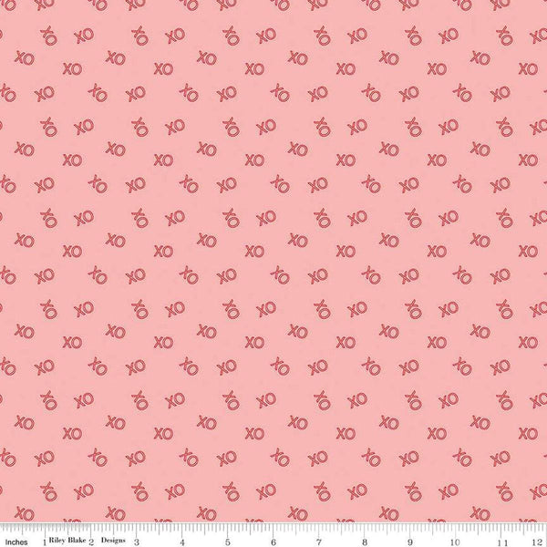 Image of the Sweetheart XO Pink quilting cotton fabric by My Minds Eye for Riley Blake Designs. Features Xs and Os on a pink background.
Cute Little Fabric Shop