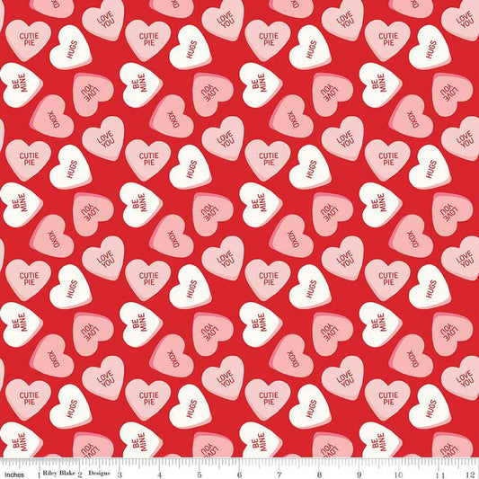 Image of the Sweetheart Main Red quilting cotton fabric by My Mind's Eye for Riley Blake Designs. Features conversation hearts on a red background.
Cute Little Fabric Shop