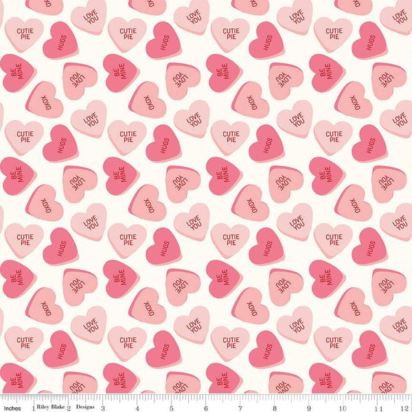 Image of the Sweetheart Main Cream quilting cotton fabric by My Minds Eye for Riley Blake Designs. Features conversation hearts on a cream background.
Cute Little Fabric Shop