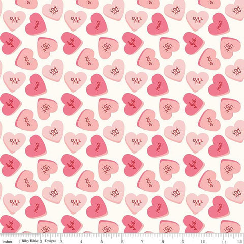 Image of the Sweetheart Main Cream quilting cotton fabric by My Minds Eye for Riley Blake Designs. Features conversation hearts on a cream background.
Cute Little Fabric Shop