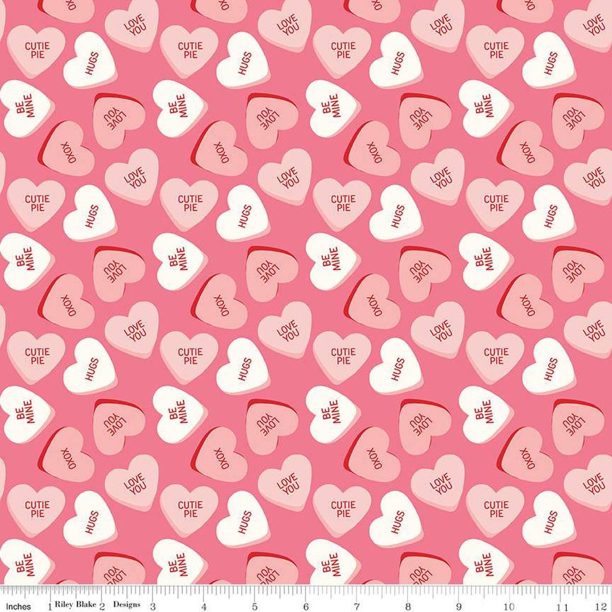 Image of the Sweetheart Main Hot Pink quilting cotton fabric by My Minds Eye for Riley Blake Designs. Features conversation hearts on a pink background.
Cute Little Fabric Shop