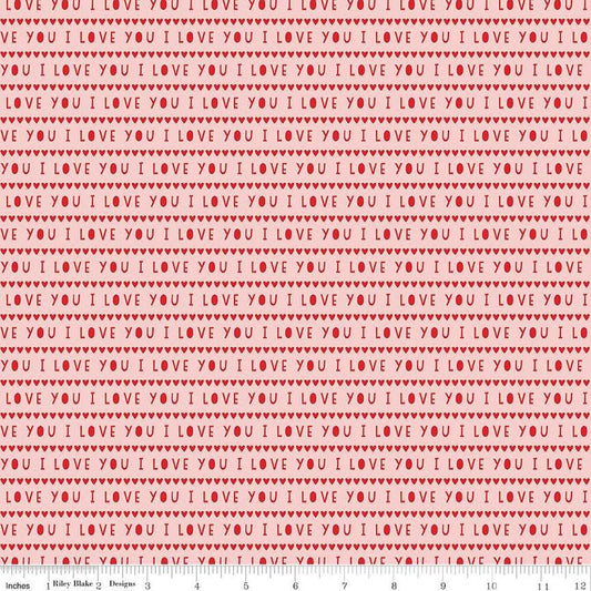 Image of the Sweetheart I Love You Pink quilting cotton fabric by My Minds Eye for Riley Blake Designs. Features striped I Love You words on a light pink background.
Cute Little Fabric Shop