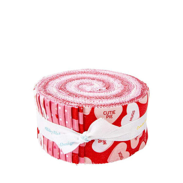 Image of the Sweetheart Rolie Polie by My Minds Eye for Riley Blake Designs. Features valentines day fabrics with red, pink, and cream backgrounds. 
Cute Little Fabric Shop