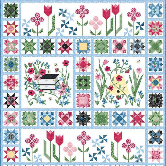 Image of the Sewing Bee Sew Along Quilt Pattern by Jillily Studio for Riley Blake Designs. Features a complex floral quilt with blue, pink, and green colors. 
Cute Little Fabric Shop