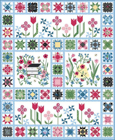 Image of the Sewing Bee Sew Along Quilt Pattern by Jillily Studio for Riley Blake Designs. Features a complex floral quilt with blue, pink, and green colors. 
Cute Little Fabric Shop