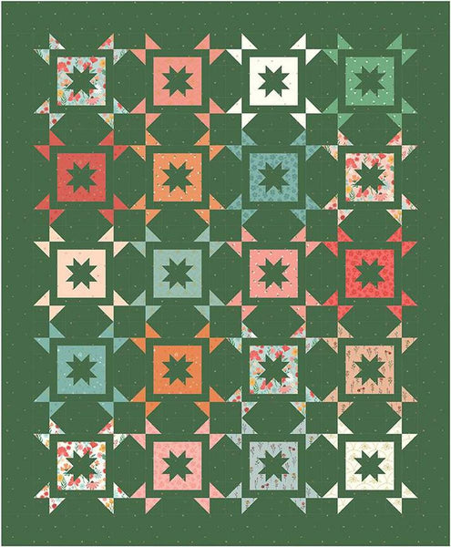 Image of the Wild and Free Quilt Pattern by Amanda Niederhauser for Riley Blake Designs. Features pieced star blocks on a green background. 
Cute Little Fabric Shop