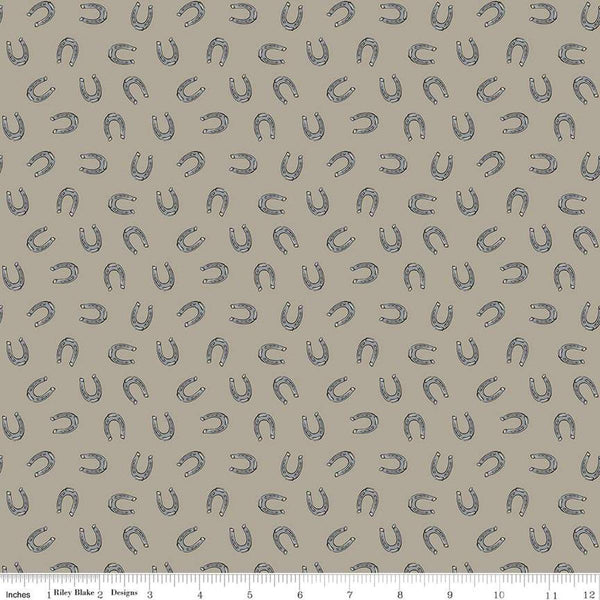 Image of the Cowboys Horseshoes Khaki quilting cotton fabric by Echo Park Paper Co for Riley Blake Designs. Features horseshoes on a brown grey background.
Cute Little Fabric Shop