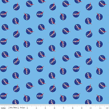 Image of the Outer Space by NASA Logo Toss Sky quilting cotton fabric by NASA for Riley Blake Designs. Features the NASA Logos on a light blue background. 
Cute Little Fabric Shop