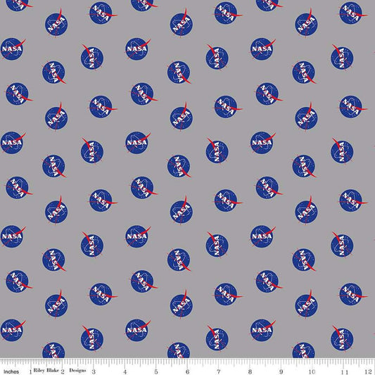 Image of the Outer Space by NASA Logo Toss Gray quilting cotton fabric by NASA for Riley Blake Designs. Features the NASA Logos on a gray background. 
Cute Little Fabric Shop
